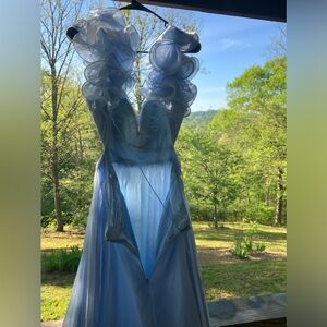 This blue Mac Duggal dress has only been worn once.